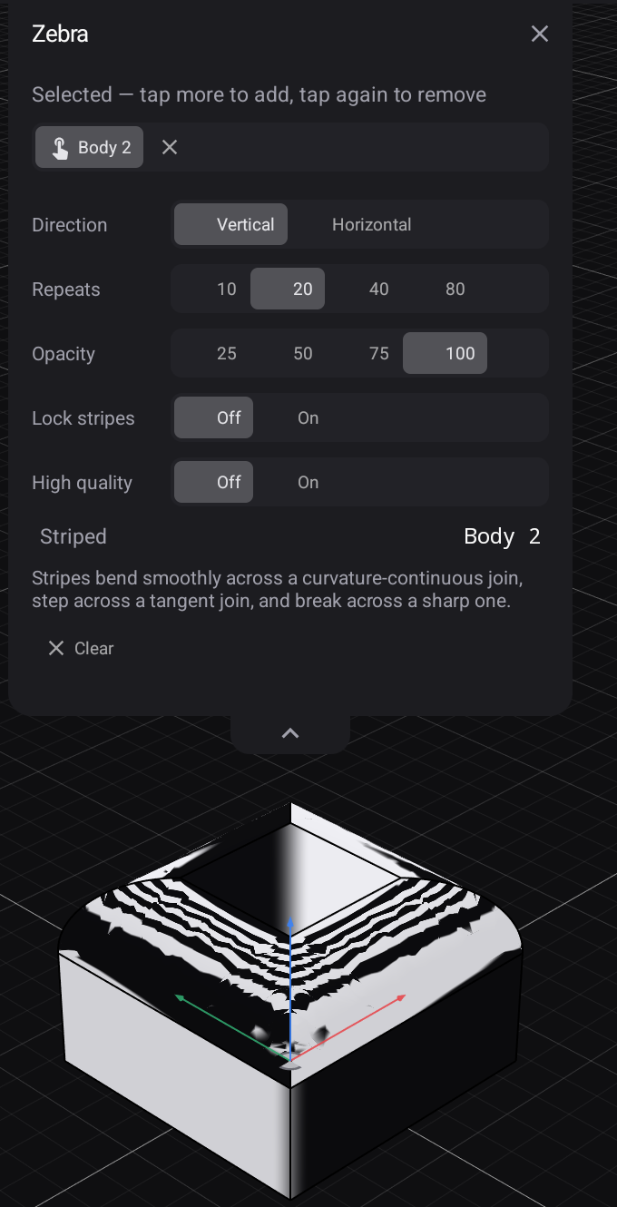 Zebra on a filleted block — the stripes step where the fillet meets the walls, a tangent join made visible